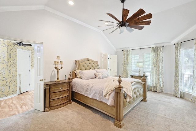 carpeted bedroom featuring multiple windows, crown molding, lofted ceiling, and ceiling fan