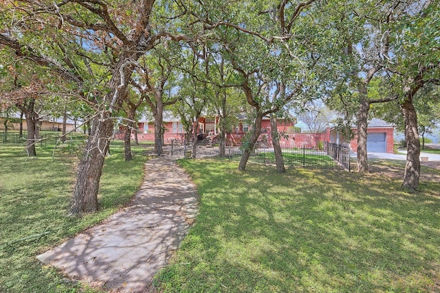 view of yard featuring a garage