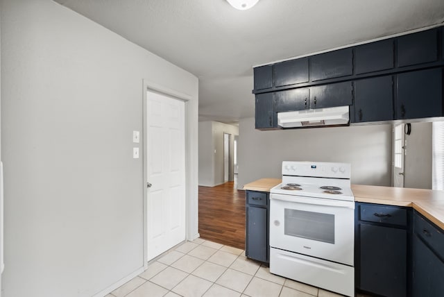 kitchen featuring light hardwood / wood-style floors, a textured ceiling, and white electric stove