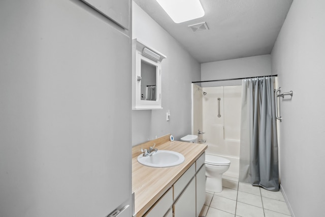 full bathroom featuring shower / bath combination with curtain, toilet, tile patterned flooring, and vanity