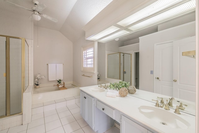 bathroom with vaulted ceiling, vanity, independent shower and bath, ceiling fan, and tile patterned flooring