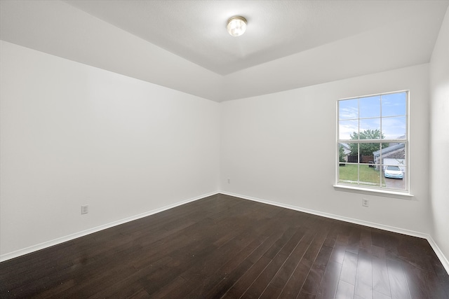 unfurnished room featuring dark hardwood / wood-style floors