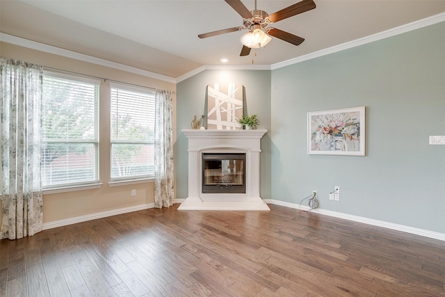 unfurnished living room featuring ceiling fan, crown molding, vaulted ceiling, and wood-type flooring