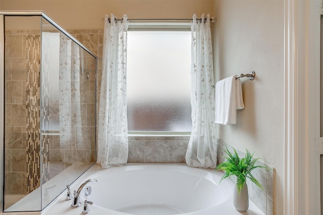 bathroom with independent shower and bath