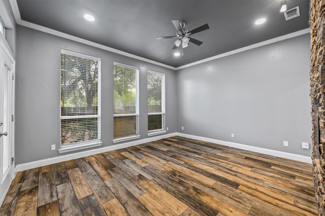 unfurnished room featuring ornamental molding, ceiling fan, and hardwood / wood-style floors