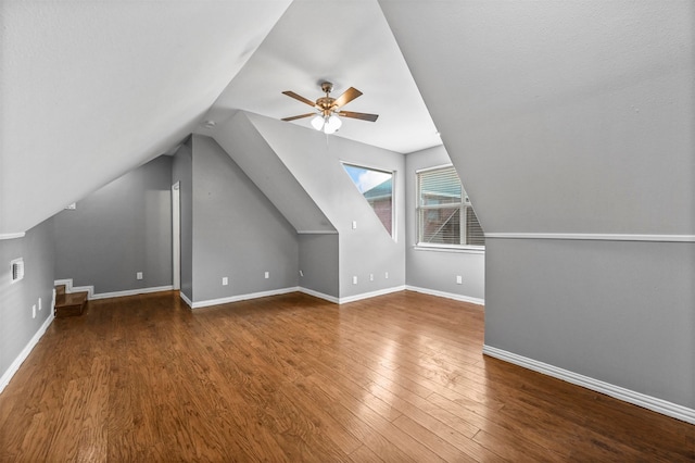 bonus room featuring ceiling fan, lofted ceiling, and wood-type flooring