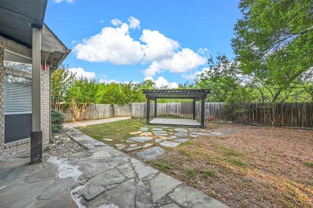 view of yard featuring a pergola and a patio area