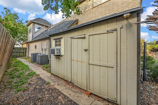 view of outdoor structure featuring central AC unit