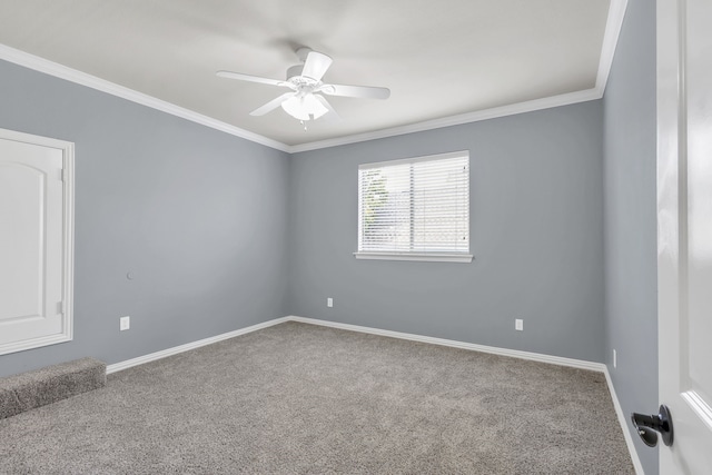 unfurnished room with carpet floors, ornamental molding, and ceiling fan