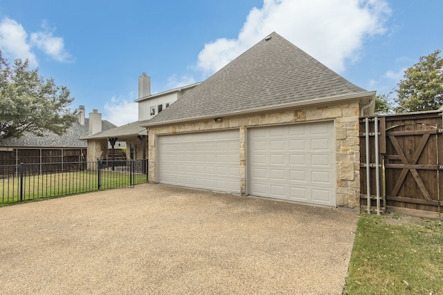 garage with a yard