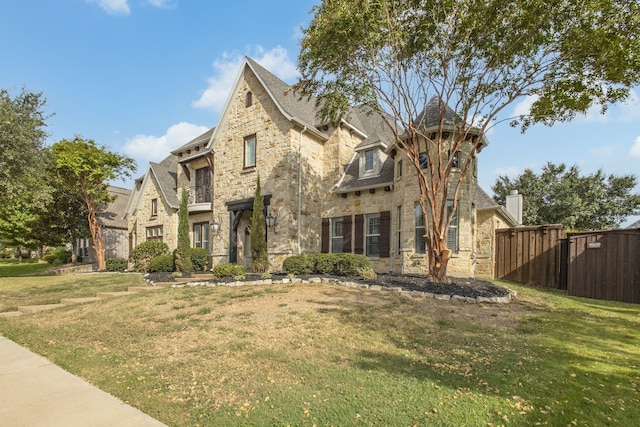 view of front of home with a front yard