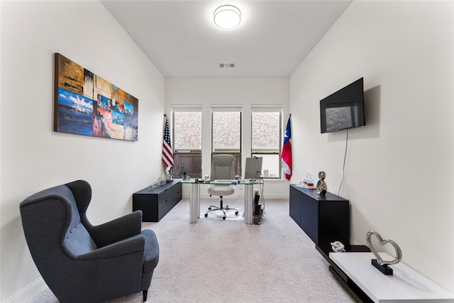 office area featuring carpet and visible vents