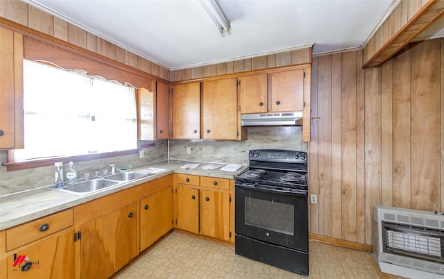 kitchen with sink, heating unit, decorative backsplash, and electric range