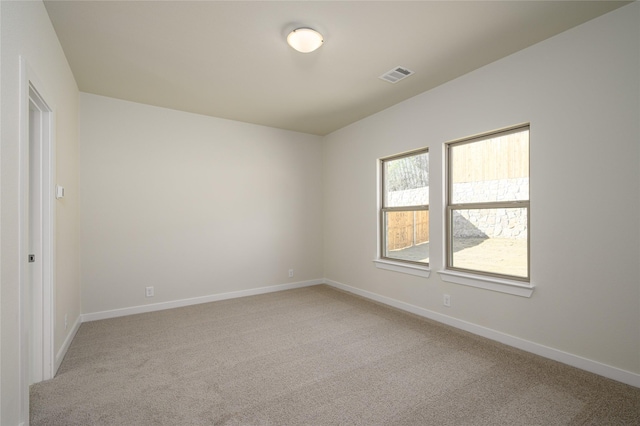 view of carpeted spare room