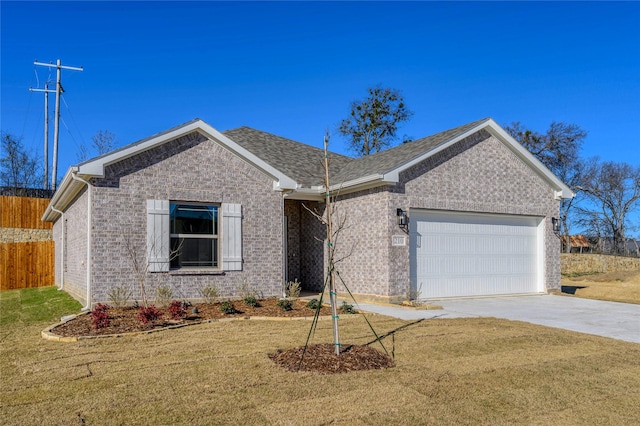 single story home featuring a front yard and a garage