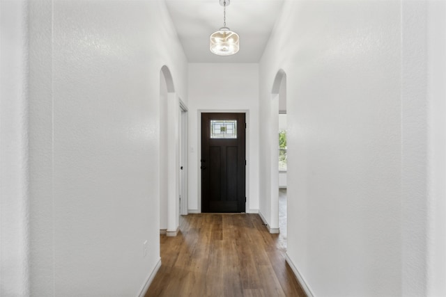 doorway featuring dark hardwood / wood-style flooring