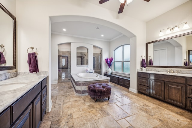 bathroom with vanity, crown molding, separate shower and tub, and ceiling fan