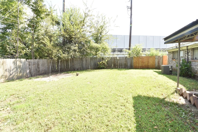 view of yard featuring central AC