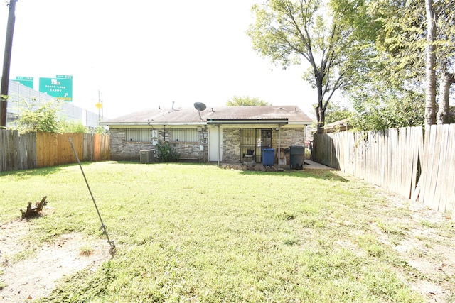 view of yard featuring central AC