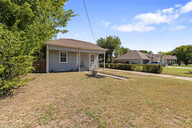 view of front facade featuring a front yard