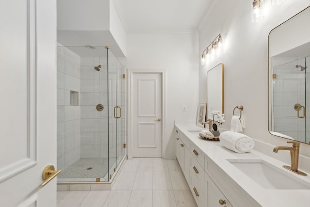 bathroom with vanity, tile patterned flooring, ornamental molding, and an enclosed shower