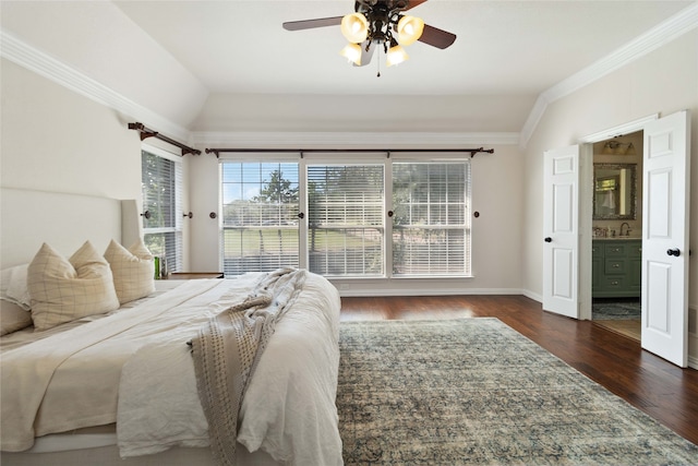 bedroom with vaulted ceiling, ceiling fan, ensuite bathroom, ornamental molding, and dark hardwood / wood-style floors