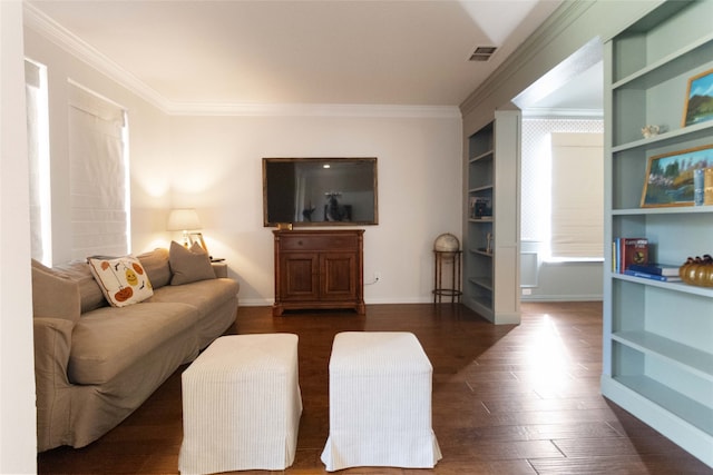 living room featuring crown molding and dark wood-type flooring