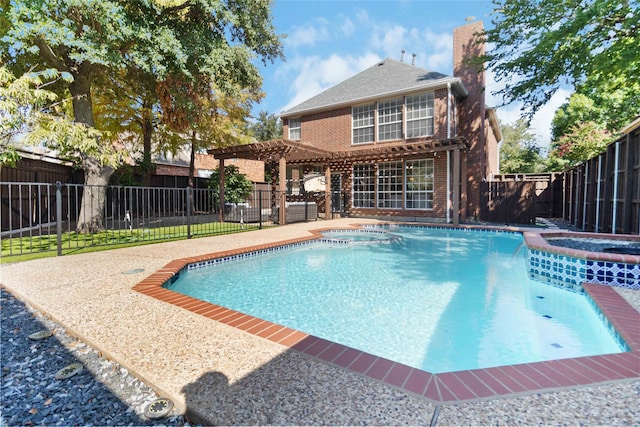 view of pool featuring a pergola, a patio area, and an in ground hot tub