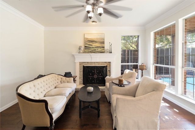 living room featuring ornamental molding, ceiling fan, plenty of natural light, and dark hardwood / wood-style flooring