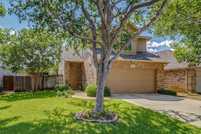 view of front of house with a garage and a front lawn