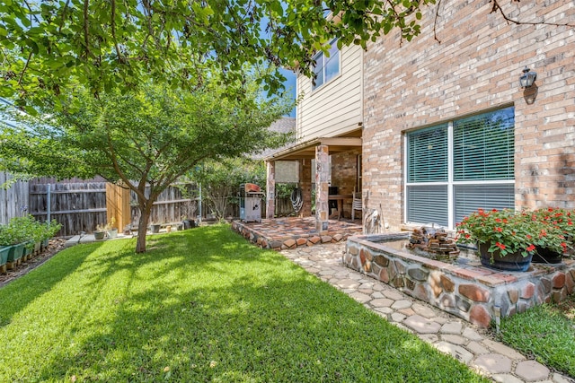 view of yard with a patio area