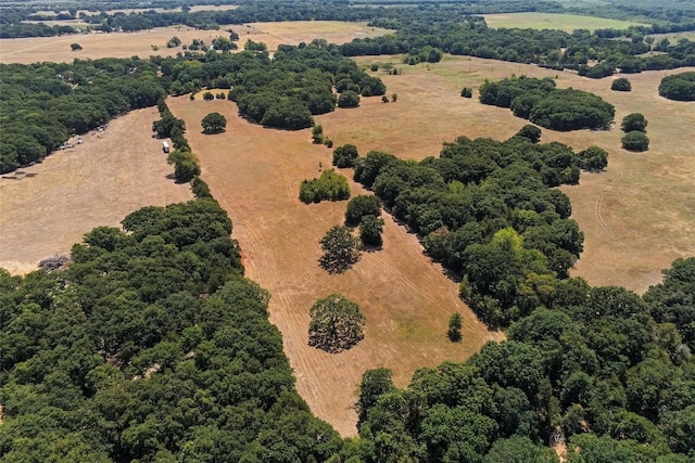 birds eye view of property featuring a rural view