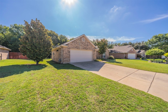 exterior space with a garage and a yard