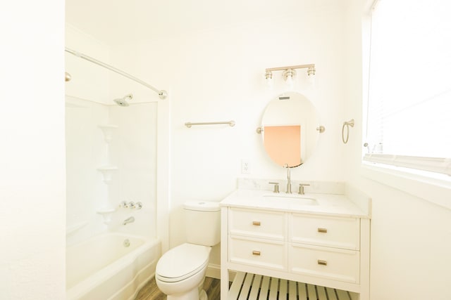 full bathroom featuring vanity, toilet, shower / bathing tub combination, and hardwood / wood-style flooring