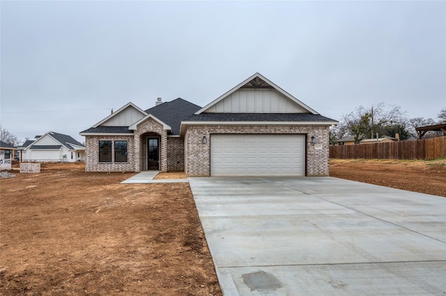 view of front of property featuring a garage