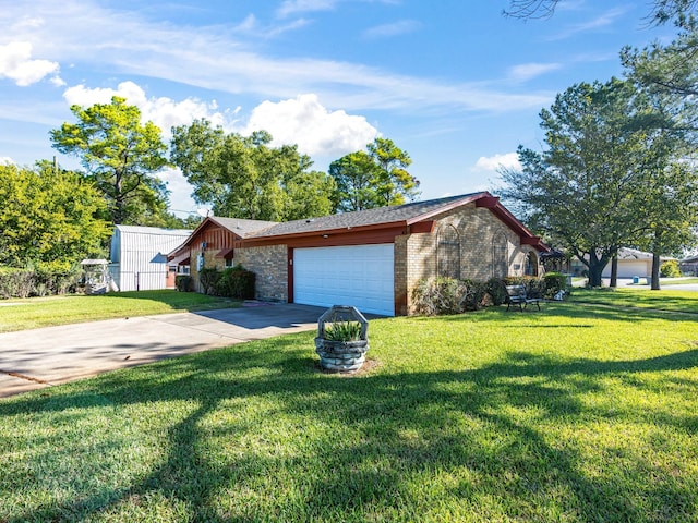 view of front of house featuring a front yard and a garage