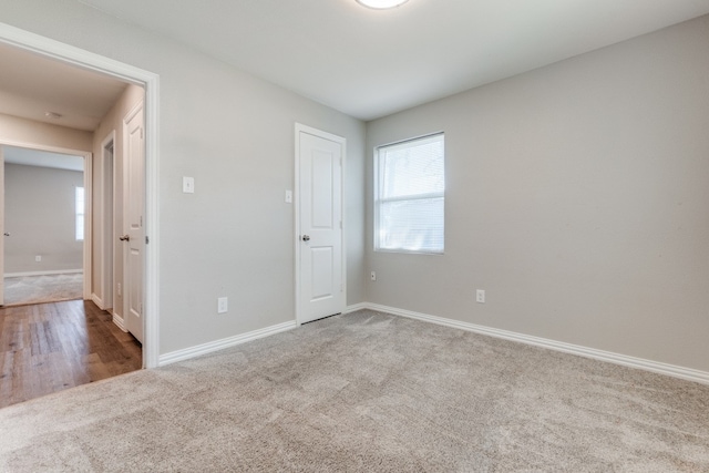 unfurnished bedroom featuring hardwood / wood-style floors