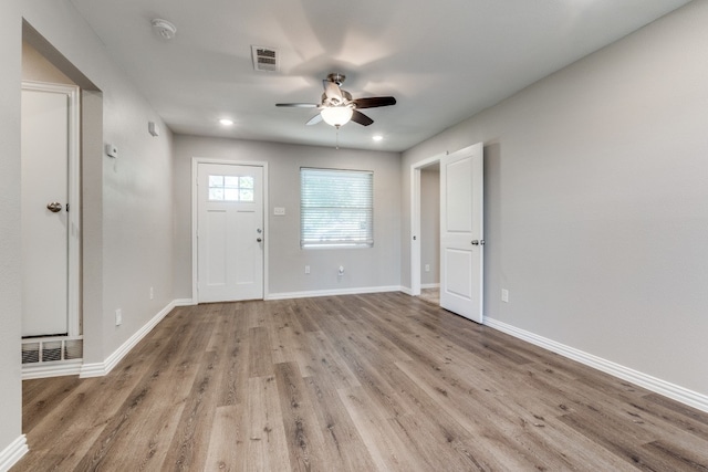 foyer featuring light hardwood / wood-style floors and ceiling fan