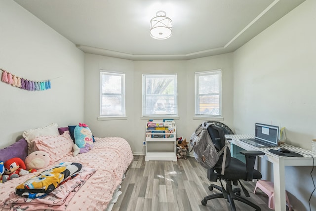 bedroom featuring hardwood / wood-style floors