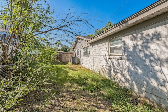 view of yard featuring central AC