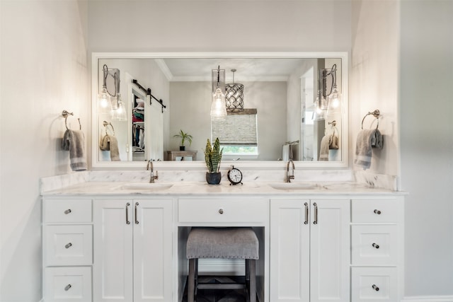 bathroom with vanity and crown molding