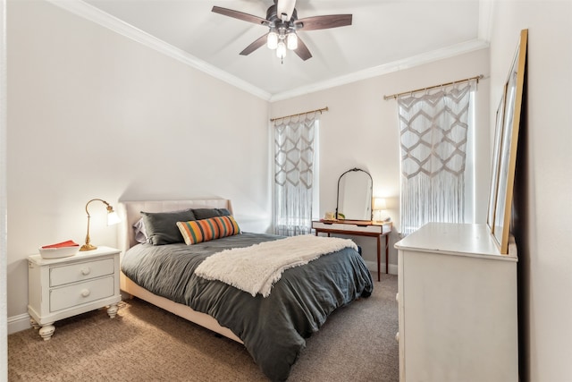 bedroom with carpet floors, ornamental molding, and ceiling fan