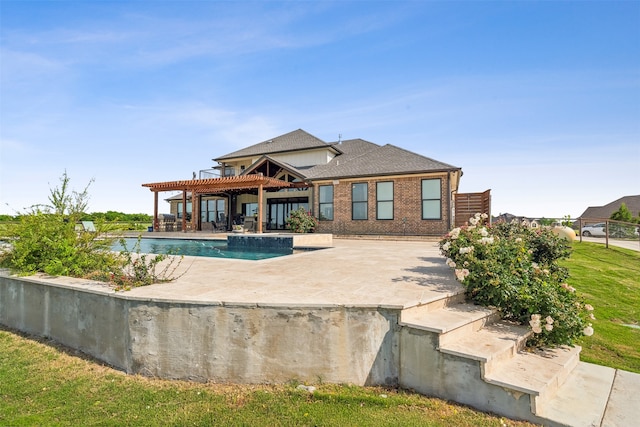 rear view of property with a patio area, a gazebo, and a yard