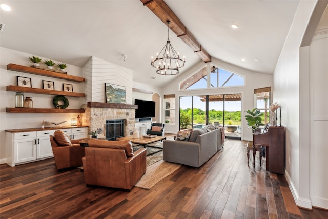 living room with a chandelier, beamed ceiling, high vaulted ceiling, a stone fireplace, and dark hardwood / wood-style flooring