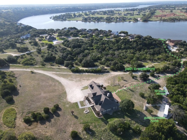 drone / aerial view with a water view