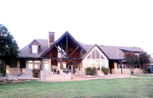 exterior space with a lawn and a patio