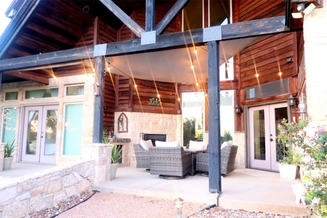 doorway to property with french doors and a patio area