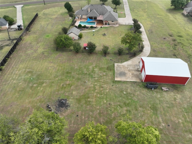 birds eye view of property featuring a rural view