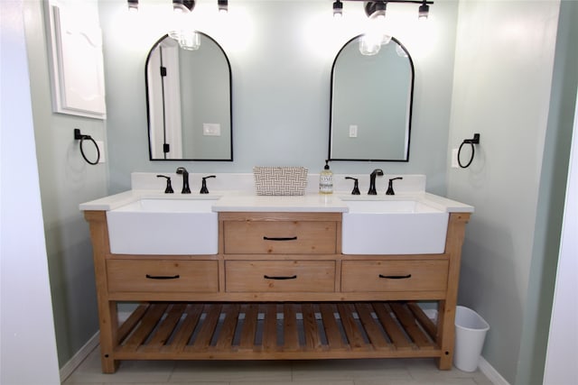 bathroom featuring tile patterned floors and vanity