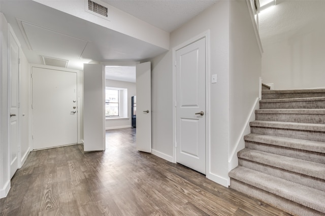 interior space with hardwood / wood-style flooring